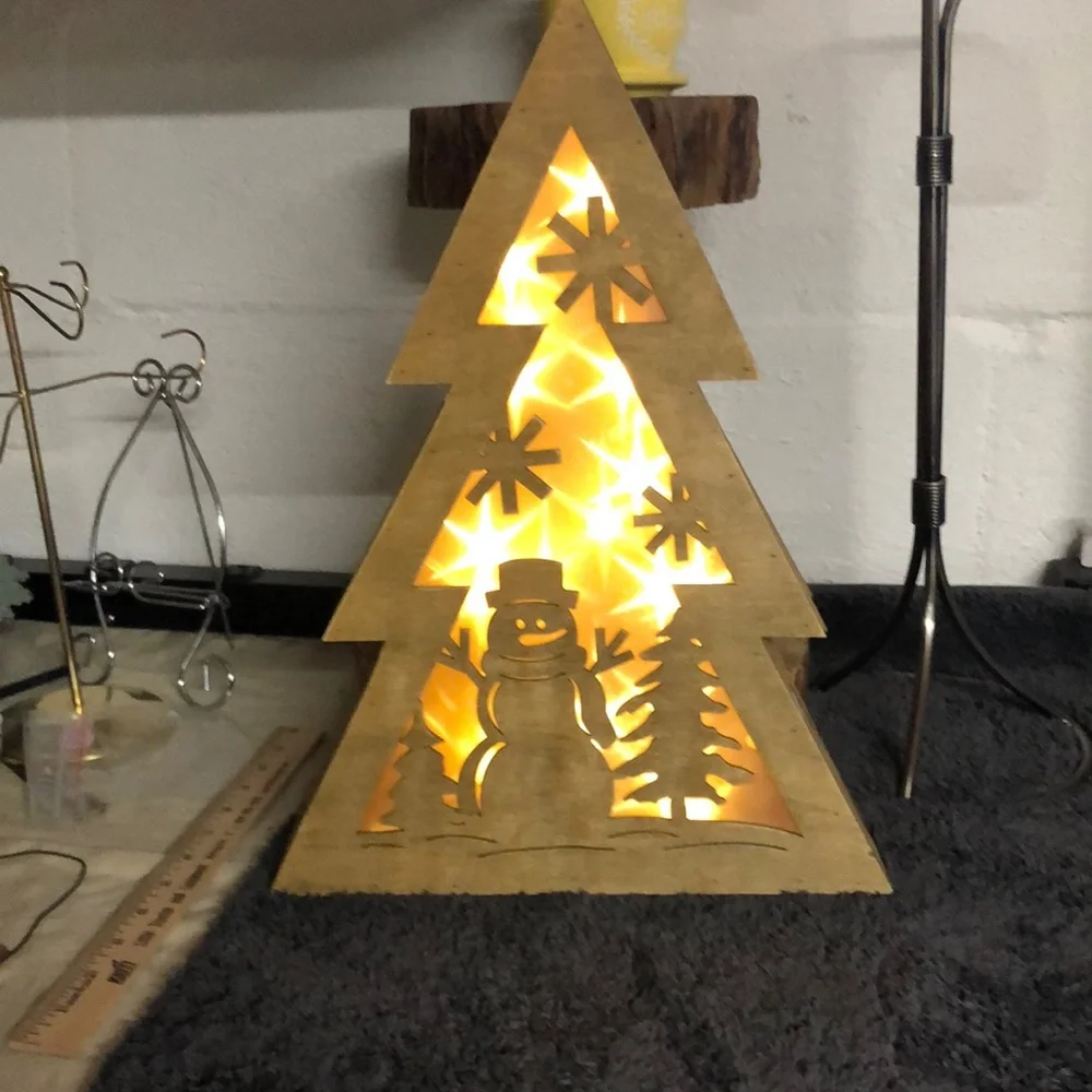Wooden lighted tree snowman‎ and snowflakes